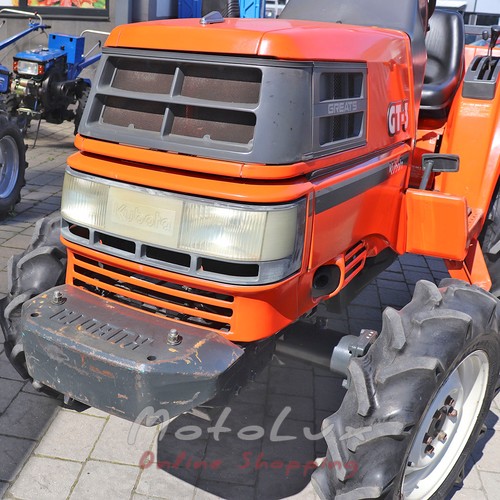 Kubota GT3 mini tractor with cutter, was in use, orange
