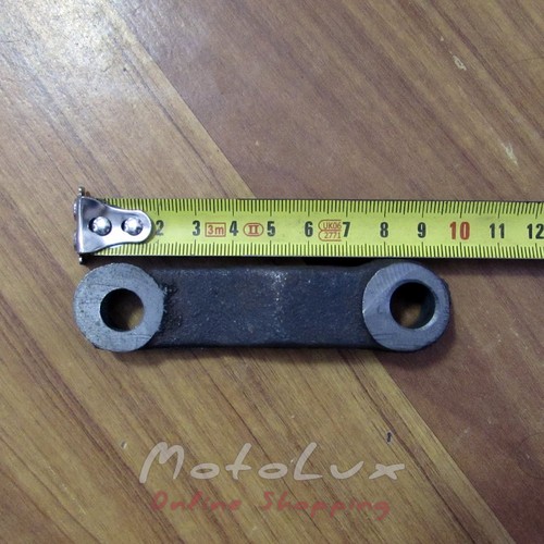 Tensioning pulley bracket for R190